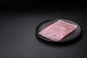 Ham cut into square slices for making delicious nutritious sandwiches photo