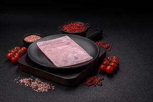 Ham cut into square slices for making delicious nutritious sandwiches photo