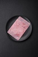 Ham cut into square slices for making delicious nutritious sandwiches photo