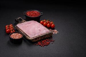Ham cut into square slices for making delicious nutritious sandwiches photo