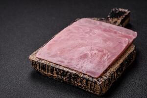 Ham cut into square slices for making delicious nutritious sandwiches photo