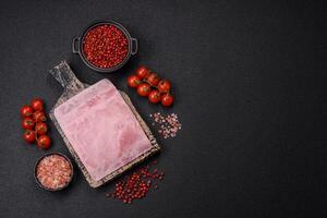 Ham cut into square slices for making delicious nutritious sandwiches photo