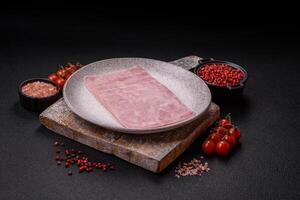 Ham cut into square slices for making delicious nutritious sandwiches photo