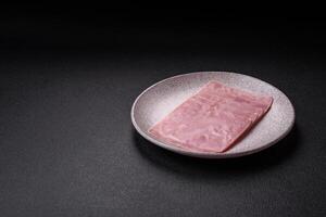 Ham cut into square slices for making delicious nutritious sandwiches photo