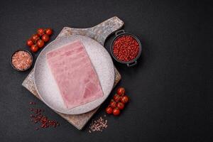 Ham cut into square slices for making delicious nutritious sandwiches photo