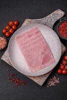 Ham cut into square slices for making delicious nutritious sandwiches photo