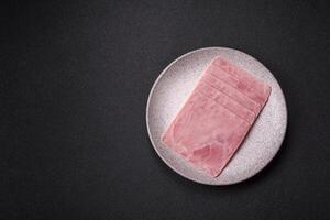 Ham cut into square slices for making delicious nutritious sandwiches photo