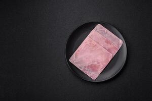 Ham cut into square slices for making delicious nutritious sandwiches photo