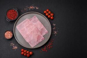 Ham cut into square slices for making delicious nutritious sandwiches photo