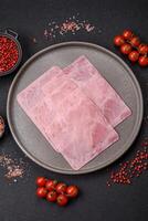 Ham cut into square slices for making delicious nutritious sandwiches photo