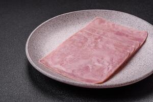 Ham cut into square slices for making delicious nutritious sandwiches photo