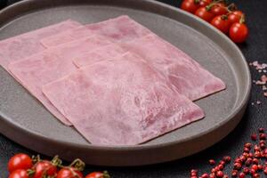 Ham cut into square slices for making delicious nutritious sandwiches photo