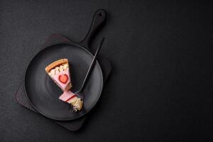Sweet cheesecake with mascarpone or Philadelphia cheese, jelly and strawberries photo