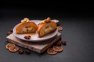 Sweet crispy croissant with salted caramel and glazed popcorn photo