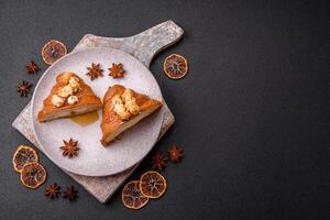 Sweet crispy croissant with salted caramel and glazed popcorn photo