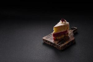 Sweet delicious cake with a layer of raspberry jam photo