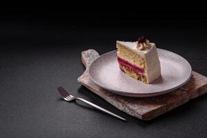 Sweet delicious cake with a layer of raspberry jam photo