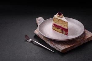 Sweet delicious cake with a layer of raspberry jam photo