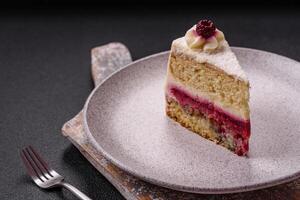 Sweet delicious cake with a layer of raspberry jam photo