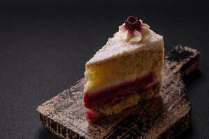 Sweet delicious cake with a layer of raspberry jam photo