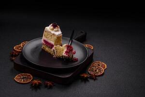 Sweet delicious cake with a layer of raspberry jam photo