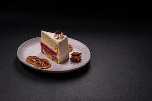 Sweet delicious cake with a layer of raspberry jam photo