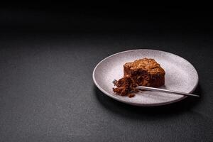 Chocolate sweet brownie cake in a square shape photo