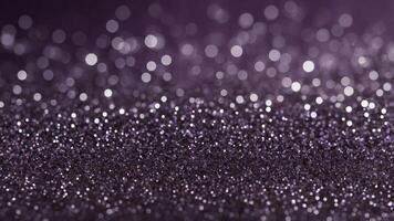 A close up of a purple and silver background. photo
