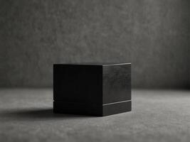 A minimalist black plinth with clean sharp lines ideal for highlighting minimalist objects. photo
