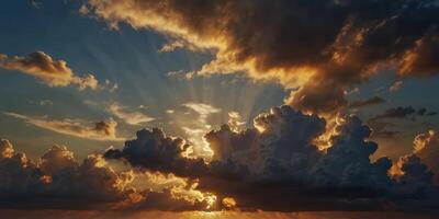 Clouds hang low in the sky with beams of golden crepuscular rays shining through the breaks creating a heavenly and peaceful scene. photo