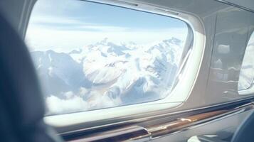 Guests aboard this highend private jet can escape the hustle and bustle of everyday life while taking in the peaceful and breathtaking views of snowcapped peaks through the window photo