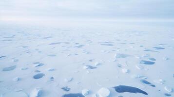 Vast fields of melting ice stretch out beneath the aerial lens, highlighting the devastating effects of climate change on the polar environment. photo