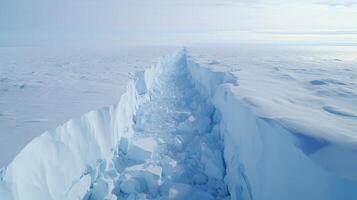 A surreal sight unfolds in this stunning footage, as a drone captures the gradual rift and collapse of a vast ice shelf in the unforgiving polar landscape. photo