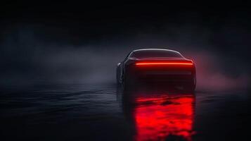 In a sea of darkness the only luminescent trail is left behind by the illuminated tail lights of a ping vehicle photo