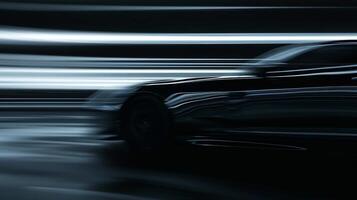 A closeup shot of a speeding vehicle its body blurred by the fast movement leaving only the distinct outline of its sleek silhouette photo
