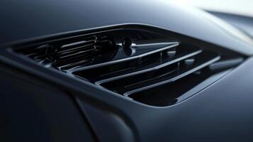 A closeup of the air vents showcases their adjustable design allowing for precise air flow direction and strength photo