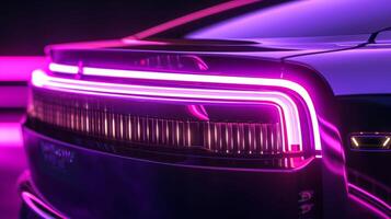 The glowing emblem of a luxury car brand backlit with a soft purple neon light adding a touch of elegance photo