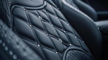 The camera slowly pans over the seat stitching revealing a gorgeous pattern of interlocking diamonds and circles in varying shades of grey showcasing the expert craftsmanshi photo