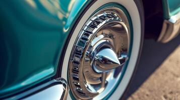 A closeup of the clic chrome hubcap of a car a symbol of the sophistication and elegance ociated with vintage automobiles photo
