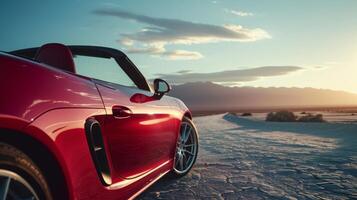 A slowmotion shot of the convertible top being raised with the wind suddenly changing direction and swirling around as the opening is closed off photo