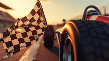 A closeup of the checkered flag being waved next to a race car with the drivers helmet visible in the background photo