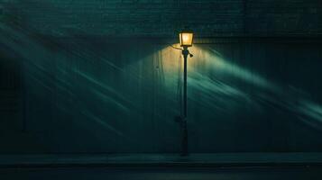 The soft glow of a lamp post its light spilling onto a deserted street creating a play of shadows that adds depth and dimension to the scene photo
