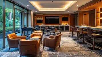 A lounge area with a foosball table comfy armchairs and a mini bar serves as the perfect spot for team bonding and unwinding after a busy day photo