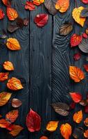 A black background with a large number of orange and red leaves scattered across it. The leaves are of various sizes and shapes, creating a sense of depth and movement. Scene is warm and inviting photo
