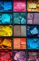 A close up of a palette of makeup with a variety of colors. The palette is made up of many small squares, each with a different color. The colors are bright and vibrant, creating a sense of energy photo