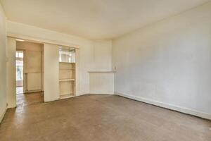 A room with a door and a window in it photo