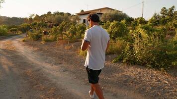 Man Finding Relax To Read While Walking In The Countryside video