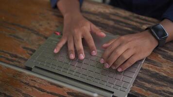 Top angle view of man hand typing on laptop keyboard. Working and writing with a laptop. video