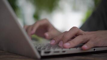 Top angle view of man hand typing on laptop keyboard. Working and writing with a laptop. video