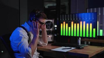 Espionage concept. Spy listens and records conversations on a reel-to-reel tape recorder, intelligence and spying on citizens video